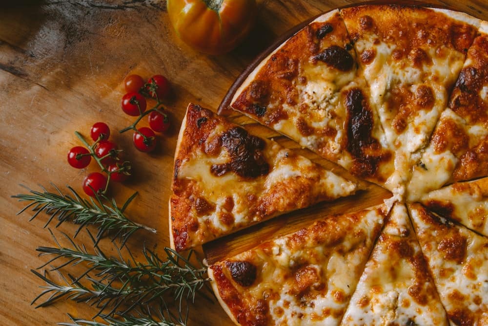 A loaded Jomaas pizza ready to be served
